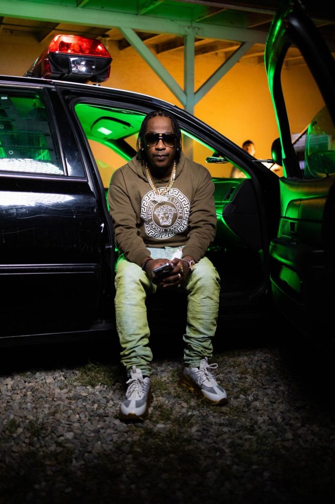 Cleveland Rapper Caine Sitting In His Car