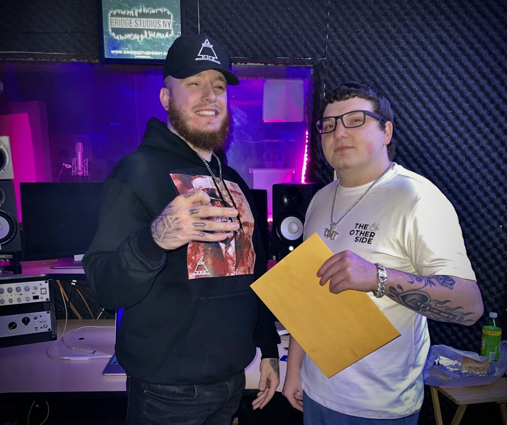Devan Childs with Dylan Toole, CEO of DMT Records